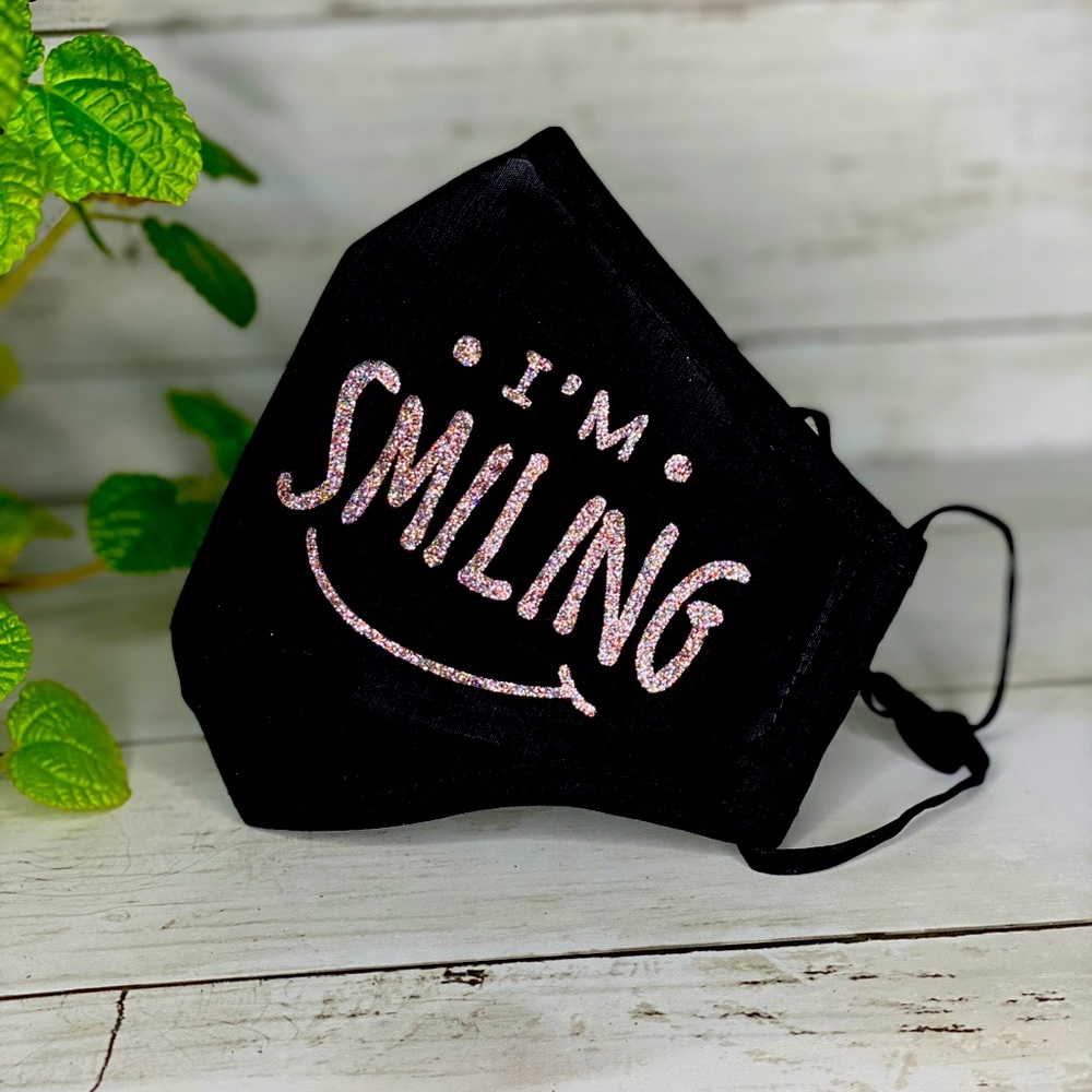 Face mask with “I’m smiling”